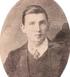 Posed sepia photo, head and shoulders of young Matthew Kinsella in pinned shirt collar and tie, waistcoat and jacket.